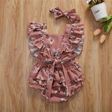 Baby girl sunsuit worn by a baby girl
