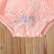  Baby girl summer romper worn by a baby girl