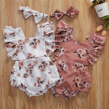 Baby girl sunsuit worn by a baby girl