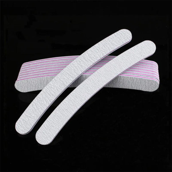 1. Buffer nail file for smooth and shiny natural nails. 2. Buffer nail file with multiple buffing surfaces for home manicure. 3. Buffer nail file removing ridges for a high-shine nail finish. 4. Compact buffer nail file suitable for fingernails and toenails. 5. Buffer nail file from Her Wardrobe & Beyond nail care collection.