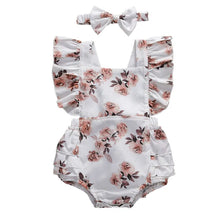 Baby girl sunsuit worn by a baby girl