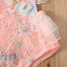  Baby girl summer romper worn by a baby girl