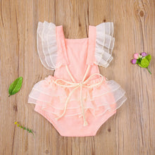  Baby girl summer romper worn by a baby girl