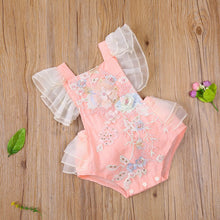  Baby girl summer romper worn by a baby girl