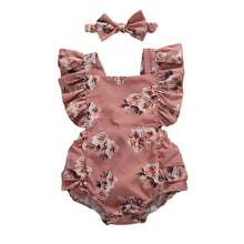 Baby girl sunsuit worn by a baby girl
