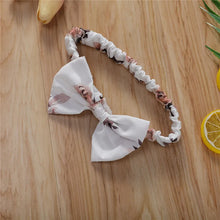 Baby girl sunsuit worn by a baby girl