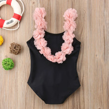 Girls swimsuit in white with 3D floral detail