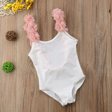 Girls swimsuit in white with 3D floral detail