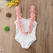 Girls swimsuit in white with 3D floral detail