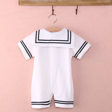 Sailor baby romper worn by a baby