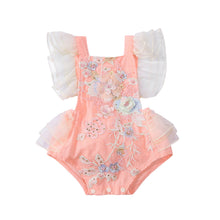  Baby girl summer romper worn by a baby girl