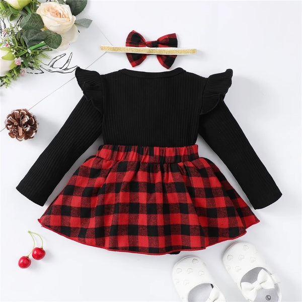  Baby christmas dress worn by a baby girl