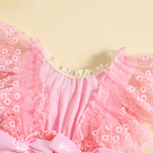 Baby girl lace bodysuit worn by a baby girl