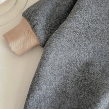 Rainbow baby jumpsuit with an attached winter hood