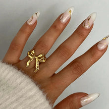 Bow ring from Her Wardrobe & Beyond jewellery collection.