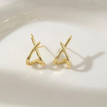 Gold cross stud earrings lightweight comfortable all-day wear.