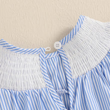 Striped baby romper worn by a baby girl