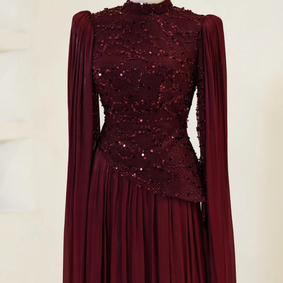 Cape Sleeves and Pleated Jersey Maxi Skirt 2026