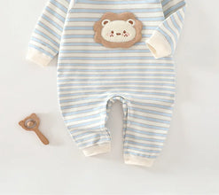Cotton baby onesie worn by a baby