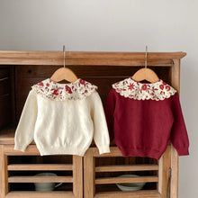  Baby girl knitted top worn by a little girl