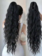 Long wavy synthetic wig featuring a sleek ponytail and loose waves, showcasing the premium heat-resistant fiber construction.