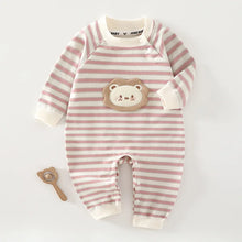 Cotton baby onesie worn by a baby