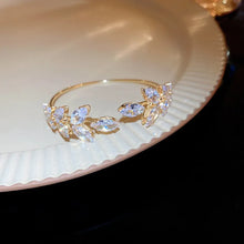 Zircon leaf gold bracelet with sparkling zircon stones