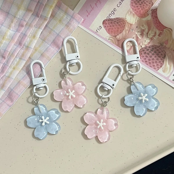 Sakura keychain resin flower showing translucent jelly cherry blossom pendant.