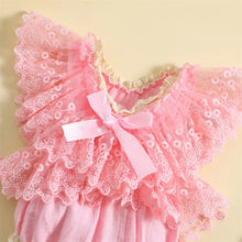 Baby girl lace bodysuit worn by a baby girl