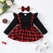  Baby christmas dress worn by a baby girl
