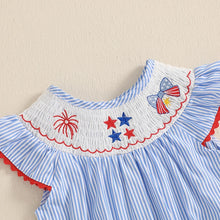 Striped baby romper worn by a baby girl