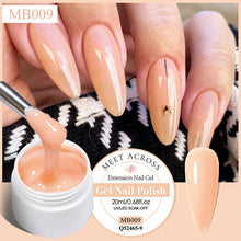 Nail gel polish with a spider design on nails, labeled 'Meet Across'.