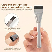 Oval foundation brush densely packed bristles for streak-free coverage.