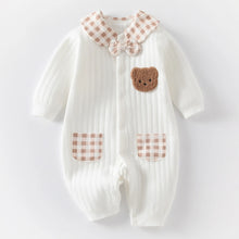  Newborn baby romper shown flat with button closures