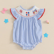Striped baby romper worn by a baby girl