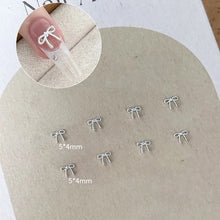 Bowknot nail charms super shiny DIY nail decoration close up