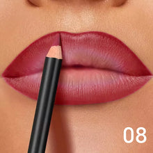 Waterproof matte lip liner in deep berry shade for a dramatic finish.