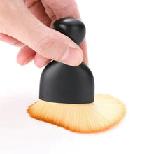 Nail art dust brush for removing acrylic dust from nails.