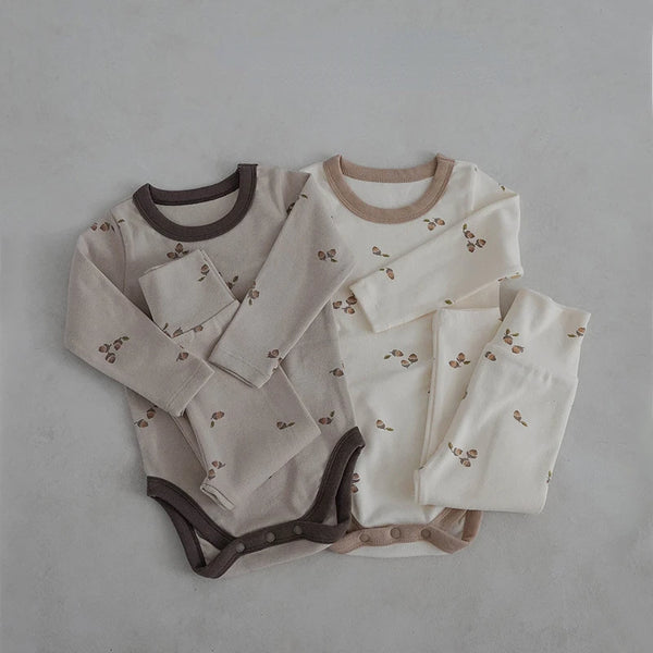  Baby romper and pants set worn by a baby