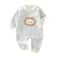 Cotton baby onesie worn by a baby
