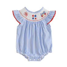 Striped baby romper worn by a baby girl