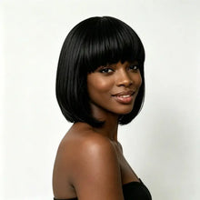 Model wearing synthetic wig with bangs for outdoor travel wear.