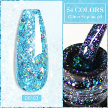 Glitter sequins gel with a nail application and product container on a light blue background.