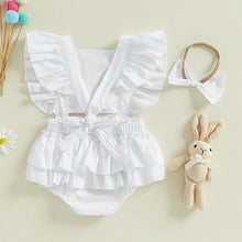 Baby easter romper worn by a baby girl