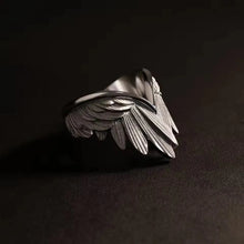 Angel wings ring adjustable worn on finger styling shot.
