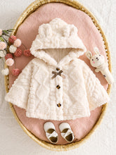 Baby girl hooded cape with button closure and wide hem