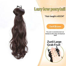 Close-up of synthetic ponytail wig clip showing secure hold design.