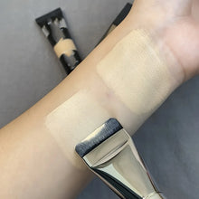 Oval foundation brush in use applying foundation for flawless finish.