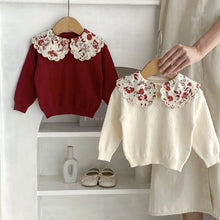  Baby girl knitted top worn by a little girl