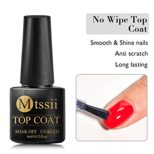 Black nail polish bottle with gold text on a white background, featuring a close-up of a red painted nail.